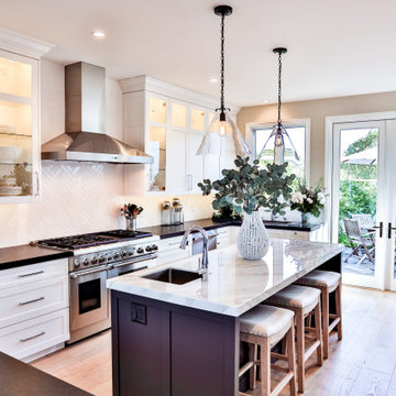 Custom handcrafted kitchen cabinetry, white painted shaker style coastal design