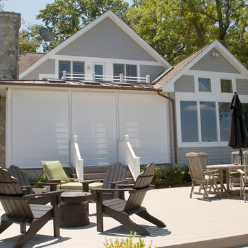 Screen Porch Shades protect porch from ocean living.