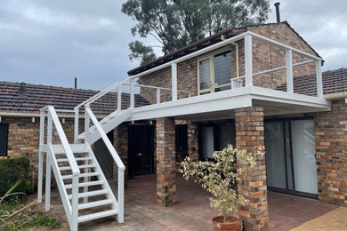Photo of a medium sized contemporary back first floor metal railing terrace in Perth with no cover.
