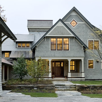 Shingle style home drive court to entry elevation