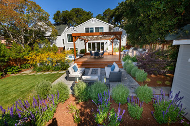 Design ideas for a mid-sized transitional backyard landscaping in San Francisco with a pergola.