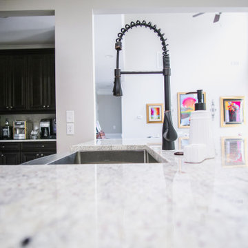 Matte Black Coil Faucet with Marble-Style Quartz Countertop