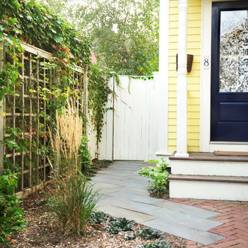 Bluestone walkway transition into front brick walkway