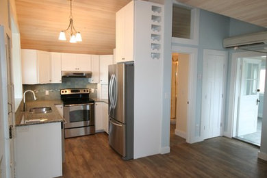 Example of a beach style kitchen design in Boston