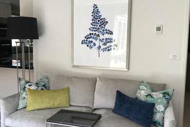 Mid-sized contemporary open concept family room in Melbourne with no fireplace and no tv.