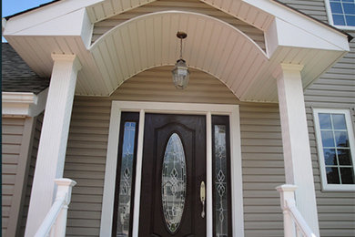 Example of a classic exterior home design in New York