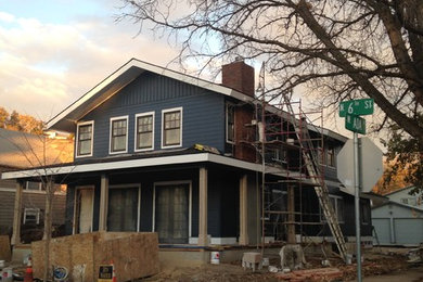 Large arts and crafts blue two-story wood gable roof photo in Boise