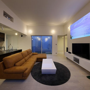 Inspiration for a modern open plan home cinema in Other with white walls, plywood flooring, a projector screen and white floors.
