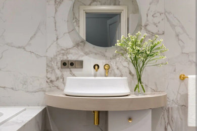 Example of a trendy master bathroom design with a floating vanity