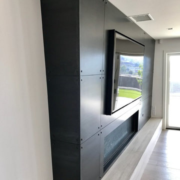 Modern Steel Fireplace and Bi-folding Door System
