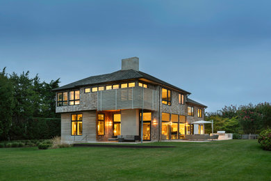 Coastal two-story house exterior idea in New York with a gray roof