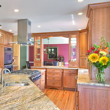 An extended island allows a prep sink convenient placement near cooktop