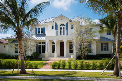 Example of an island style exterior home design in Miami