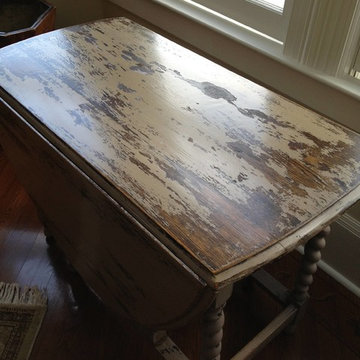 Heavily distressed, painted table