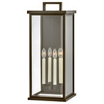 Hinkley Lighting - Hinkley Lighting Weymouth 4 Light Outdoor LG Sconce, Bronze/Beveled 20018OZ - Modernize your outdoor space without sacrificing the traditional appeal you long for. Weymouth's subtle yet overstated frame features a clean design, while its symmetrical lines evoke timeless elegance with a contemporary edge. The contrast candle sleeves in warm white balance the robust Black or Oil Rubbed Bronze aluminum cast frame. The beveled glass is an elegant touch to help refract the light.