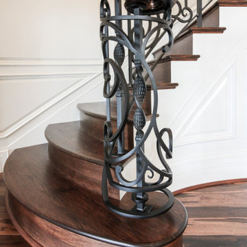 Project #74 | Circular Staircase with Hand-Forged Metal Panels