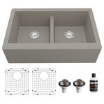 Karran USA - Karran Farmhouse Apron Front Quartz 34" Double Bowl Sink Kit, Concrete - This elegant apron front farmhouse design with its deep 9-1/4” apron blends function and form beautifully, and will look stunning in your new kitchen. It is manufactured from an extremely durable quartz composite material that will provide decades of trouble-free use. This kitchen sink apron front farmhouse design is available in a choice of 6 elegant color choices to compliment any decor. The QA-750 34-inch  double bowl 50/50 split will allow you to separate spaces for cleaning dishes. This kitchen sink kit includes two bottom grids, two basket strainers and a luster pro oil to help you maintain your new double bowl farmhouse kitchen sink.