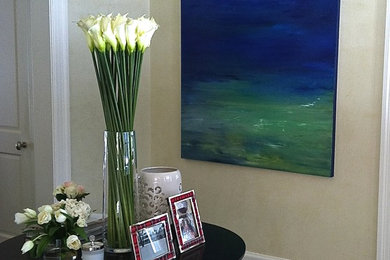 Inspiration for a mid-sized dark wood floor front door remodel in Denver with beige walls