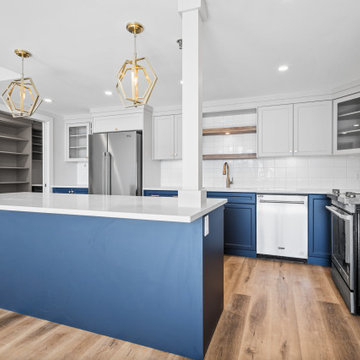 Elegant interior renovation with eye catching blue kitchen