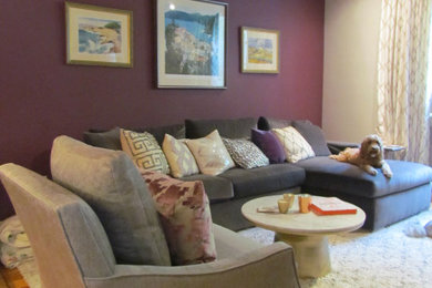 Example of a trendy living room design in New York with purple walls