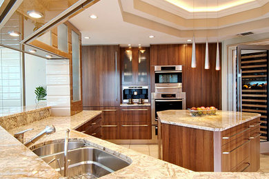 Inspiration for a large contemporary u-shaped ceramic tile and beige floor open concept kitchen remodel in Tampa with a drop-in sink, flat-panel cabinets, dark wood cabinets, marble countertops, stainless steel appliances, an island and beige backsplash