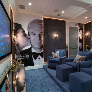 Inspiration for a large transitional enclosed carpeted and blue floor home theater remodel in Houston with white walls