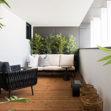 Parque das Nações balcony with outdoor table and potted tree