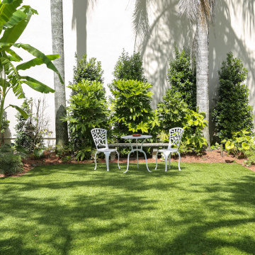 The Chloe Hotel | Garden Seating Beneath the Palms