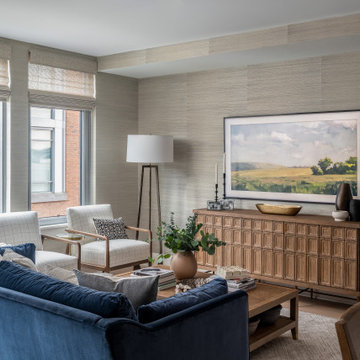 Warm Textural Living Room With Navy Sofa Neutral Grasscloth Wallpaper Woven Shad