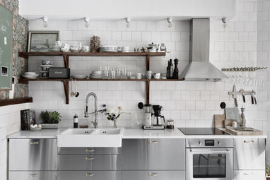 Example of a minimalist kitchen design in Other