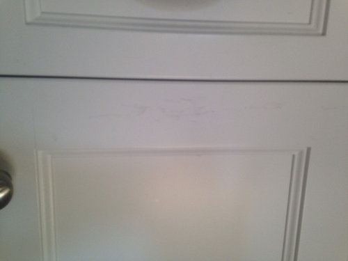 Tarnish Scuffs On Painted White Cabinets, How To Remove Scuff Marks From White Kitchen Cabinets