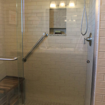 GuestBathroom Remodel with Cabinets, Quartz Countertops and Tile Shower Surround