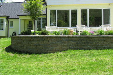 Design ideas for a full sun backyard brick garden path in Other.