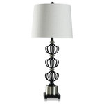 StyleCraft - Logan Steel Table Lamp Benzo Silver Finish Off-White Shade - Perfectly compliment your existing indoor lighting scheme with the StyleCraft Logan steel table lamp. This energy-efficient plug-in table lamp is a great way to add depth and warm rays of light to any indoor space. The lamp body is made from an eye-catching blend of black metal cages that are separated by silver metal breakers, making for an anything-but-ordinary look.