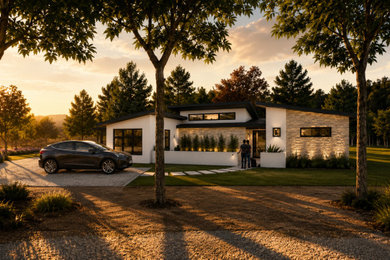 Mid-sized minimalist white one-story stucco house exterior photo in Austin with a shed roof, a metal roof and a gray roof