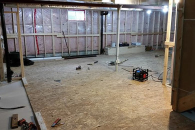 Minimalist basement photo in Toronto