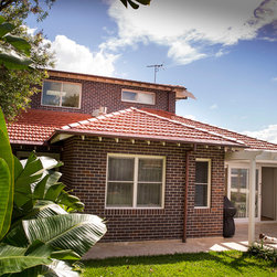TERRACOTTA BY THE OCEAN - Roofing And Gutters
