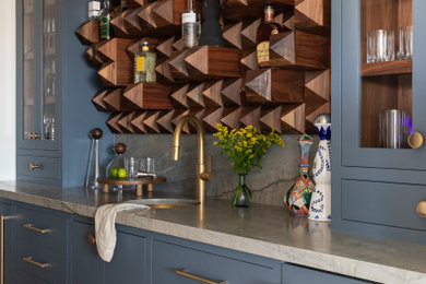 Inspiration for a coastal home bar remodel in San Diego