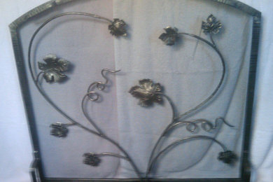 Iron fireplace screens