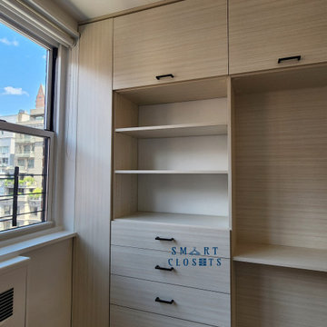 Custom Entertainment Center In White Chocolate Finish Designed by Smart Closets