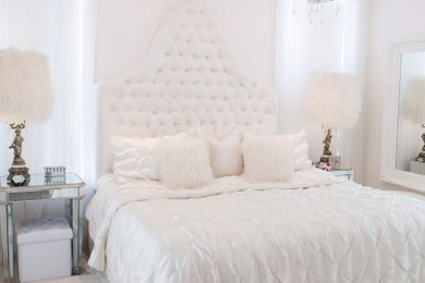 Inspiration for a large modern master porcelain tile and beige floor bedroom remodel in Montreal with white walls