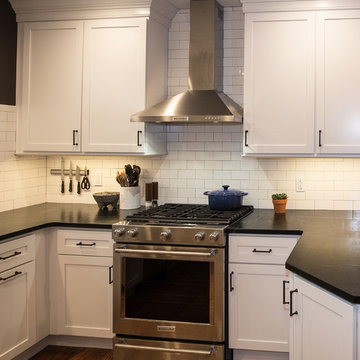 Urban Loft Kitchen Remodel | White Shaker Cabinetry & Exposed Brick
