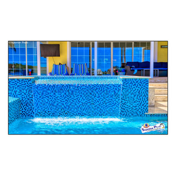 Bennett Nokomis, FL Custom Court Yard Swimming Pool & Spa With Raise Beach Area.