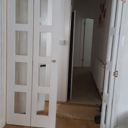 Bi-fold doors used as room dividers - Internal Doors