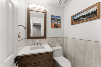 Inspiration for a small contemporary ceramic tile powder room remodel in Atlanta