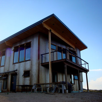Crimson Bluffs Home- Custom Designed & Fabricated Awnings and Railing