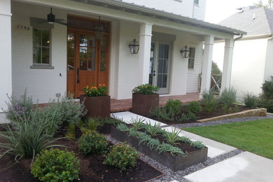 This is an example of a transitional porch design in Dallas.