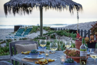 Photo of a beach style home design in Santa Barbara.