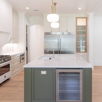 Kitchen with ample storage and wine fridge