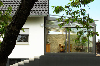 Design ideas for a contemporary conservatory in Frankfurt.
